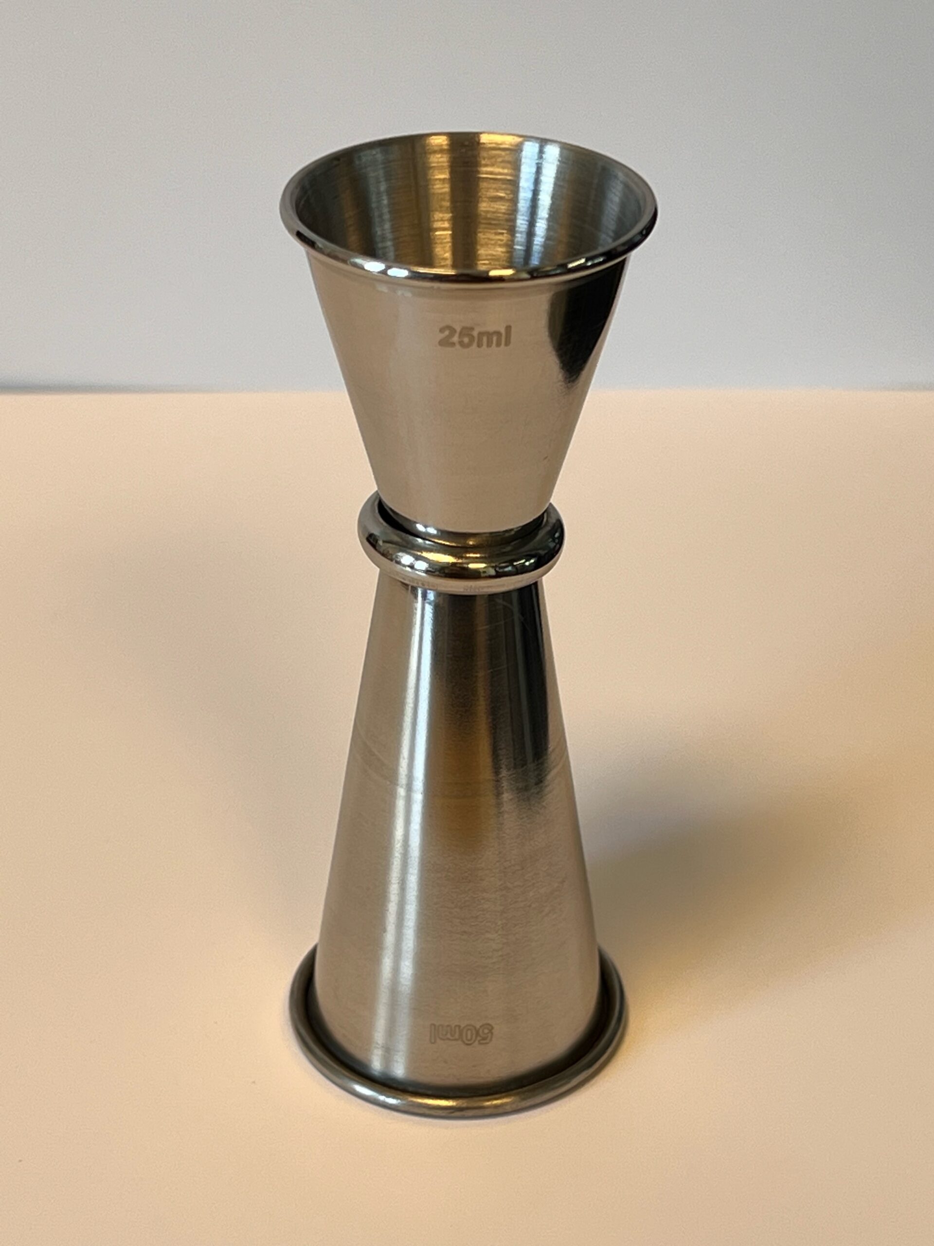 Målebeger rustfritt 25/50 ml, H12 cm, Turnor